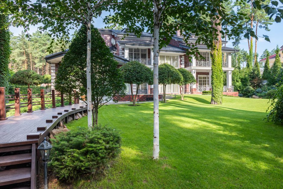 Lush green front lawn of a house